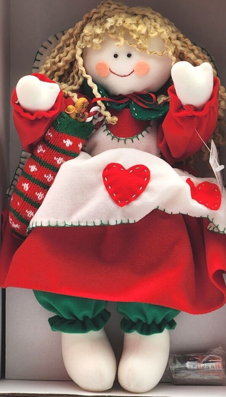 Dillard's Trimmings Animated Christmas Girl With Stocking Full Of Toys. IN BOX
